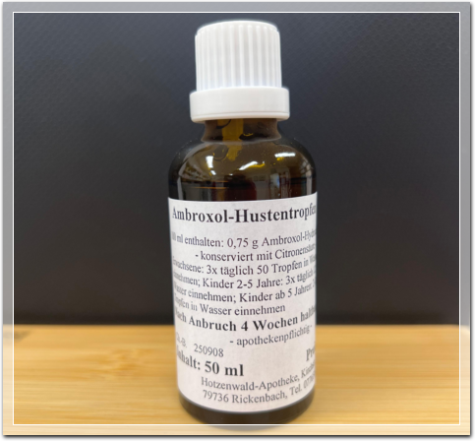 Glasflasche mit Hustentropfen