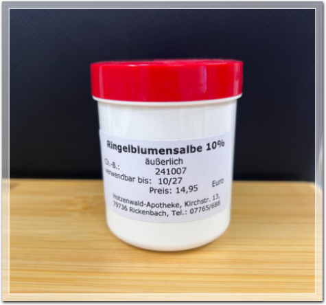 Die Tube mit rotem Deckel und Inhaltsstoffen